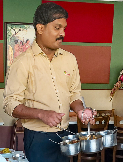 <span  class="uc_style_uc_tiles_grid_image_elementor_uc_items_attribute_title" style="color:#ffffff;">This is the 'cheap indian food service for the workers'  available at many restaurants (looks wild but great food, we think...)</span>