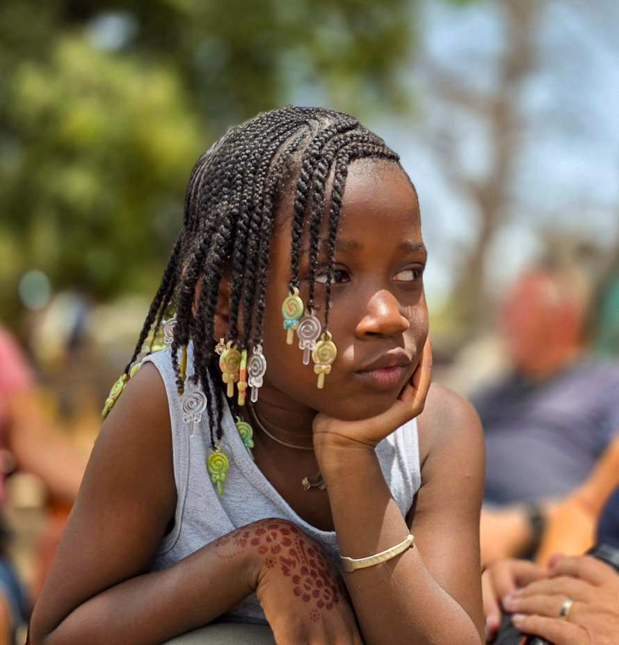 <span  class="uc_style_uc_tiles_grid_image_elementor_uc_items_attribute_title" style="color:#ffffff;">Cute Kids from West Africa</span>