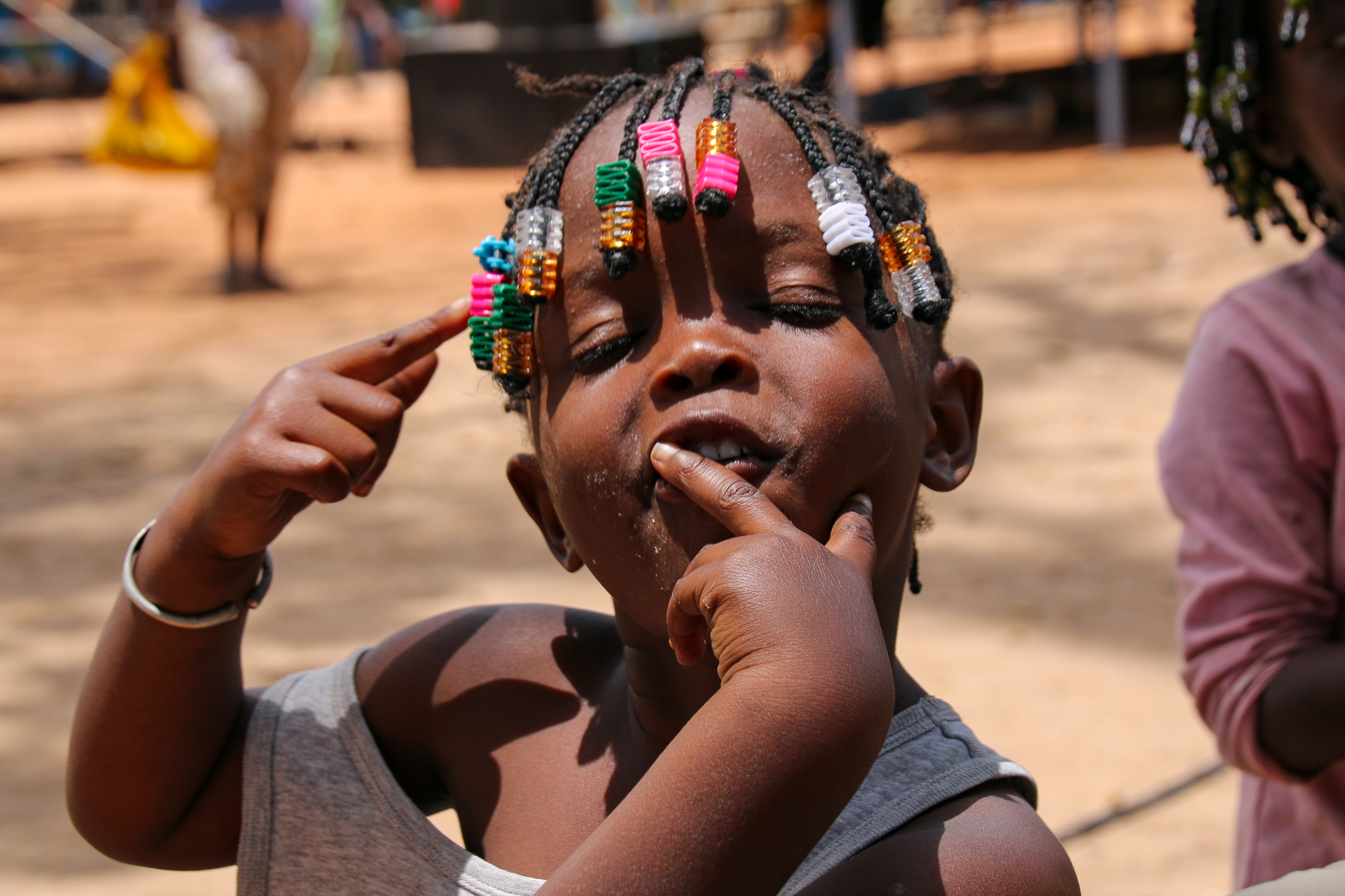 <span  class="uc_style_uc_tiles_grid_image_elementor_uc_items_attribute_title" style="color:#ffffff;">Cute Kids from West Africa</span>